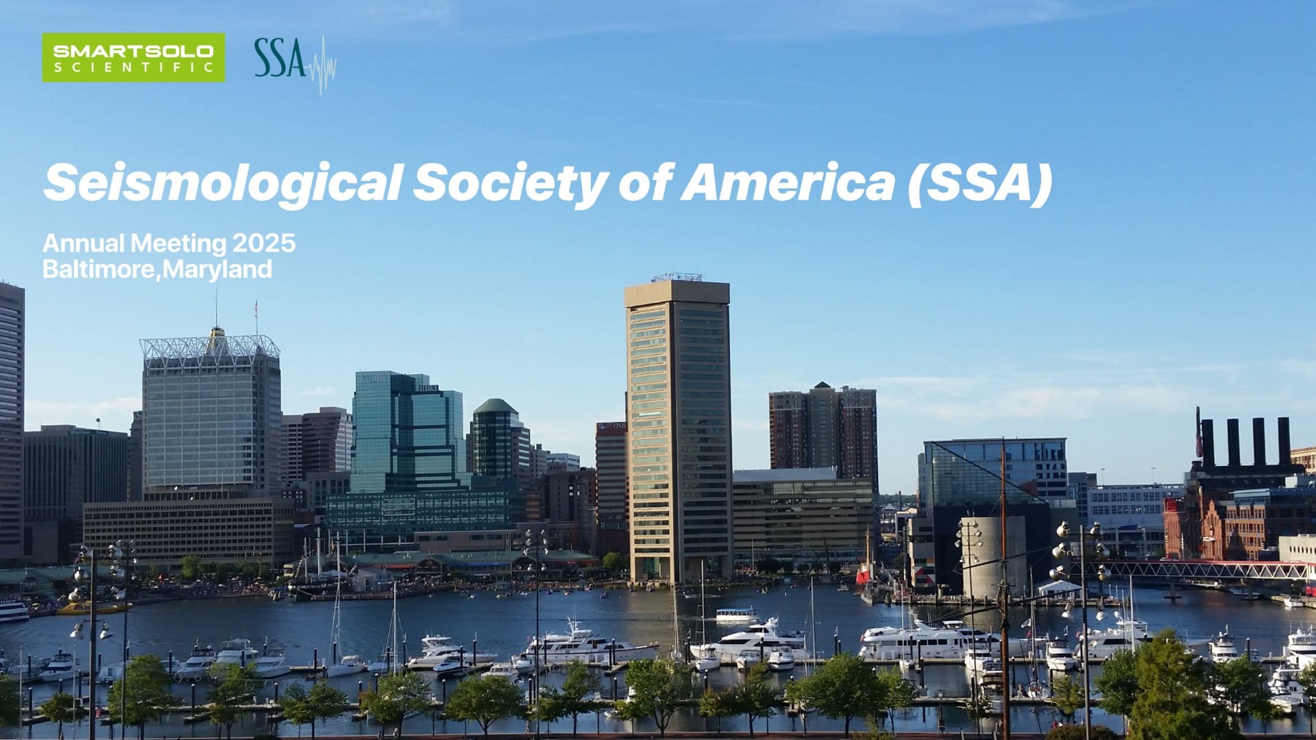 SmartSolo Scientific and SSA logos above text "Seismological Society of America (SSA) Annual Meeting 2025 Baltimore, Maryland" over a cityscape with a harbor and boats.